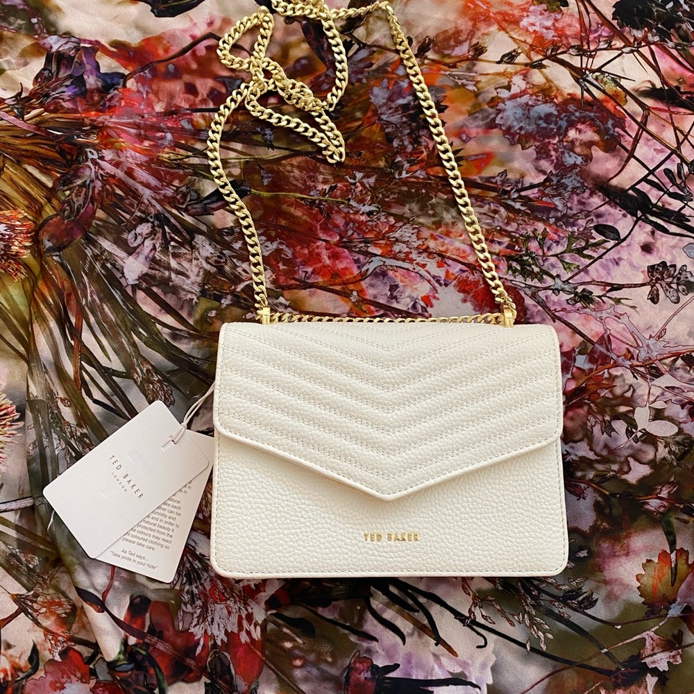 Quilted envelope mini cross body